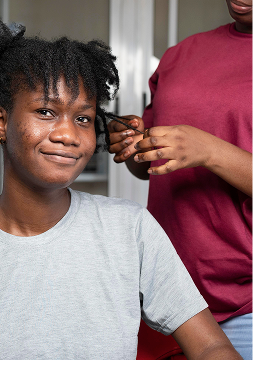 Beauty professional giving facial treatment
